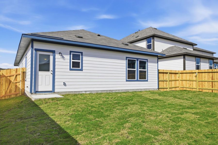 Rear of Home and Private Backyard