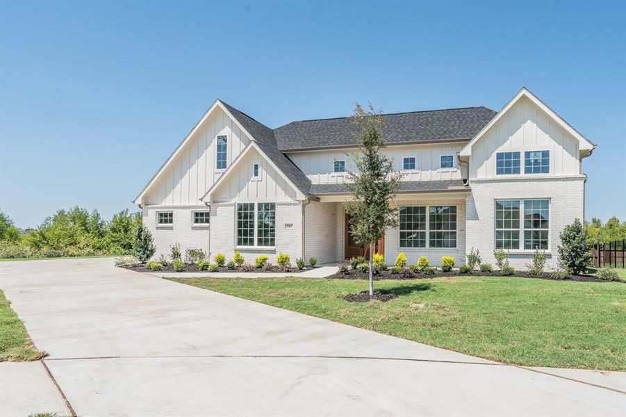 Front exterior of a new home in , Haslet, TX, highlighting curb appeal (Image 22).