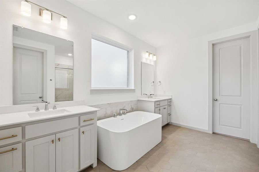 Ample room for two in this wonderful owner's bath featuring his and her vanities, a free standing tub and spacious walk in shower! Ample room for two in this wonderful owner's bath featuring his and her vanities, a free standing tub and spacious walk in shower!