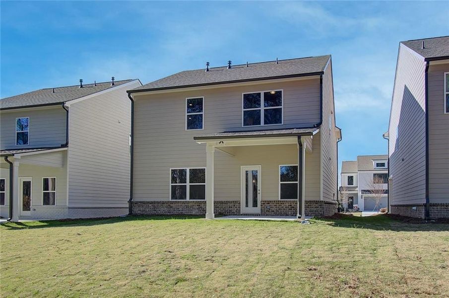 Exterior details and patio area of a home in Crofton Place Enclave, Snellville (Image 21).