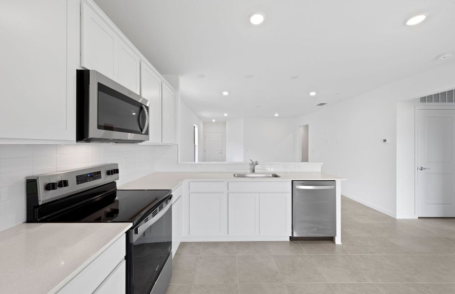 Kitchen with stainless steel appliances