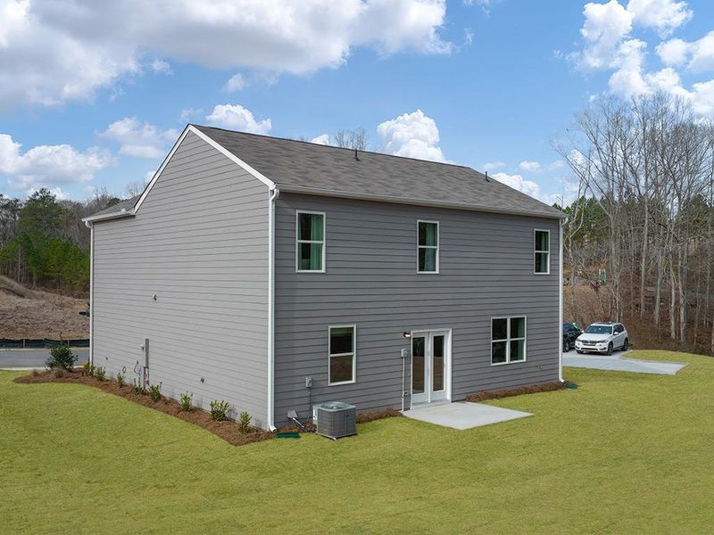 Exterior details and patio area of a home in Oaks at Cedar Grove, Fairburn (Image 3).