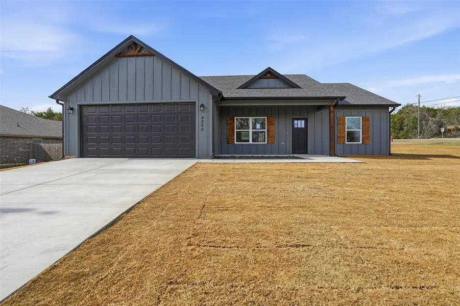 Front exterior of a new home in , Granbury, TX, highlighting curb appeal (Image 2). Front exterior of a new home in , Granbury, TX, highlighting curb appeal (Image 2).