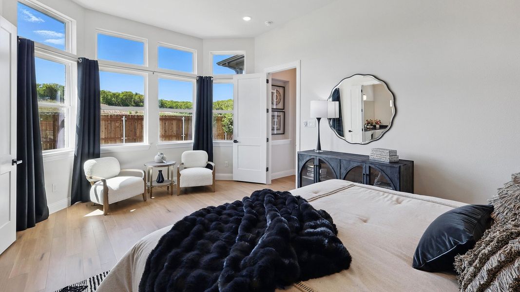 Representative furnished interior of a home built from the Juniper by Brightland Homes in Anna Ranch, Anna (Image 12).