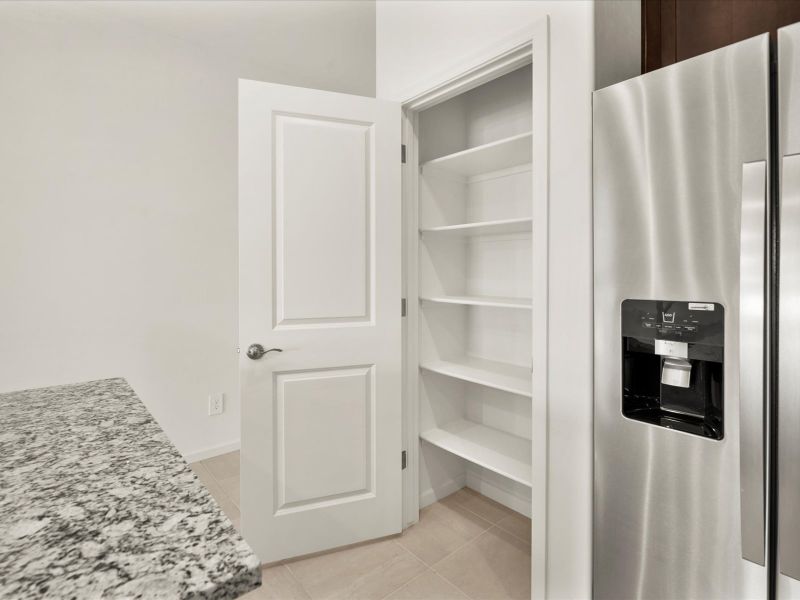 Furnished interior view inside a new home in Las Patrias at Star Valley Phase III - Signature Series, Tucson (Image 4). Furnished interior view inside a new home in Las Patrias at Star Valley Phase III - Signature Series, Tucson (Image 4).