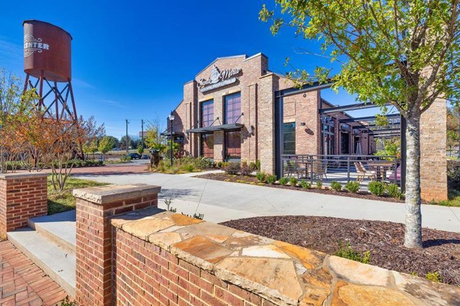 Front exterior of a new home in Hillshire, Cumming, GA, highlighting curb appeal (Image 32). Front exterior of a new home in Hillshire, Cumming, GA, highlighting curb appeal (Image 32).