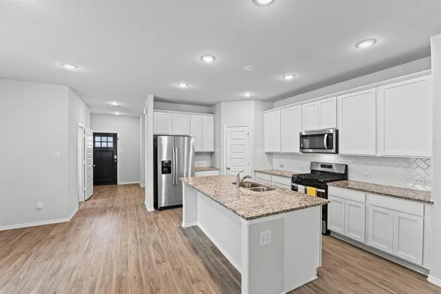 Furnished interior view inside a new home in Liberty Collection at Fairway Farms, Tomball (Image 4).