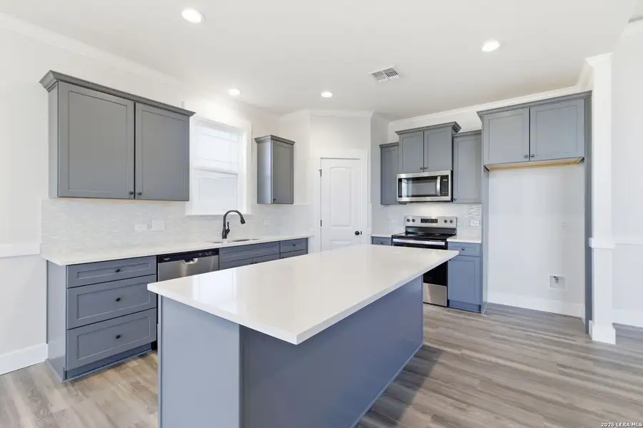 Furnished interior view inside a new home in Lonesome Dove, San Antonio (Image 7).