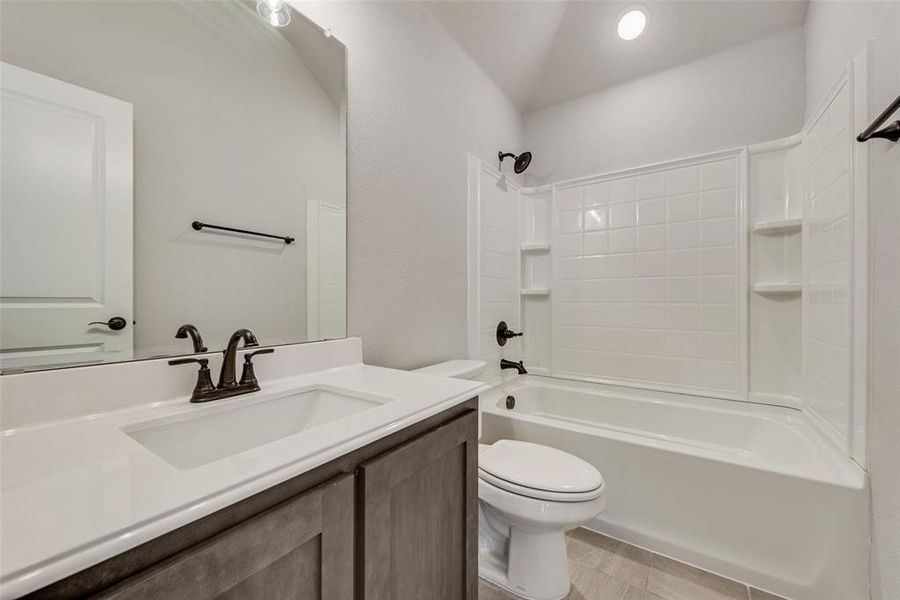 Bathroom with shower / bath combination and vanity Bathroom with shower / bath combination and vanity