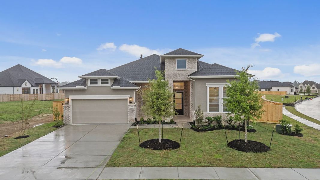 Front exterior of a new home in Briarley, Montgomery, TX, highlighting curb appeal (Image 2). Front exterior of a new home in Briarley, Montgomery, TX, highlighting curb appeal (Image 2).