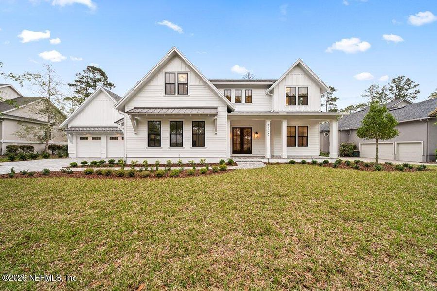 Front exterior of a new home in , Jacksonville, FL, highlighting curb appeal (Image 38).