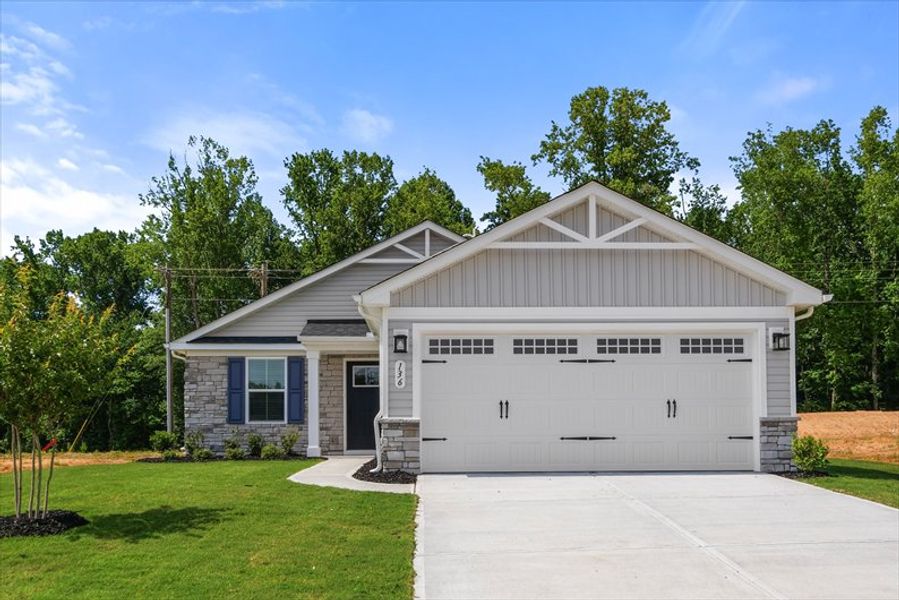 Front exterior of a new home in Wren Woods Ranches, Gray Court, SC, highlighting curb appeal (Image 1). Front exterior of a new home in Wren Woods Ranches, Gray Court, SC, highlighting curb appeal (Image 1).