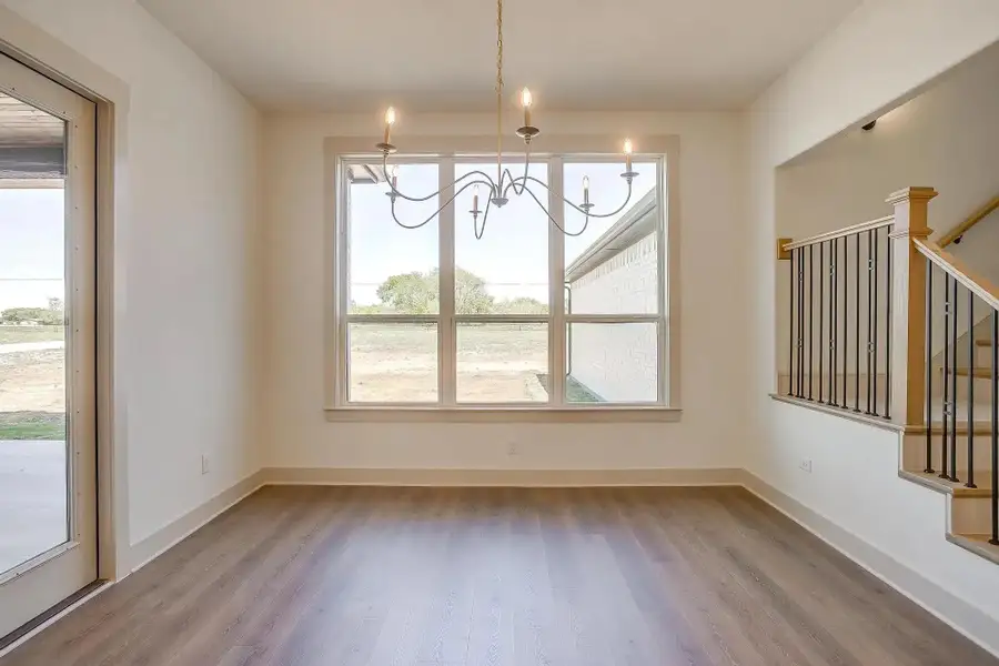 Representative unfurnished interior of a home built from the The Carley by Elmwood Custom Homes in Byrum Ranch, Maypearl (Image 52).