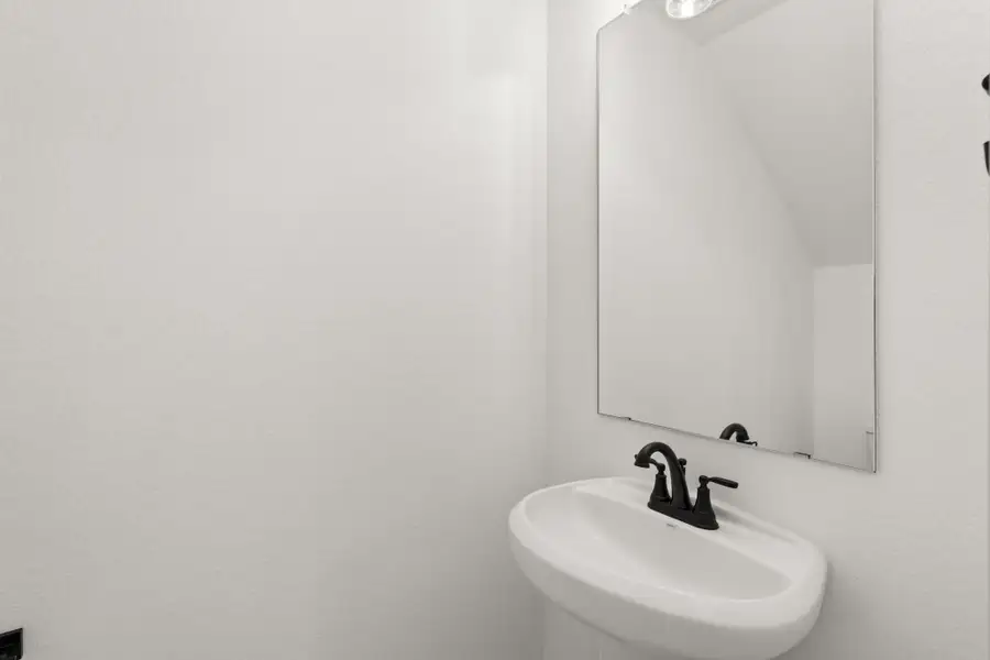 Furnished interior view inside a new home in Meridiana, Manvel (Image 3).