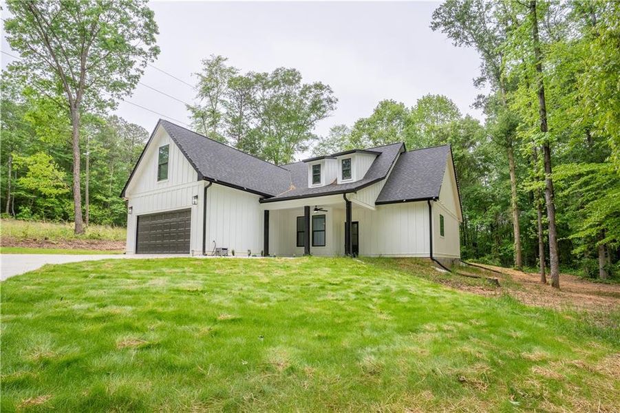Front exterior of a new home in , Commerce, GA, highlighting curb appeal (Image 30).