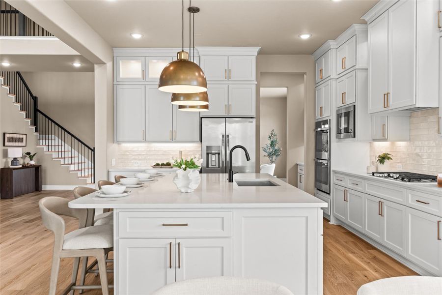 You can't go wrong with this showstopping kitchen. Every detail has been meticulously thought out. It was created to be versatile for both the gourmet chef and takeout. You will feel at home here either way! *Virtually Staged*