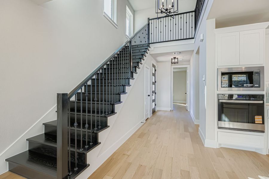 Spacious, unfurnished interior of a new home in Castle Hills Northpointe - Townhomes, Lewisville (Image 14).