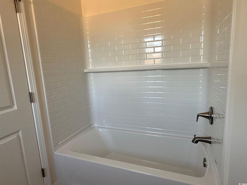 Full bath with tub / shower combination