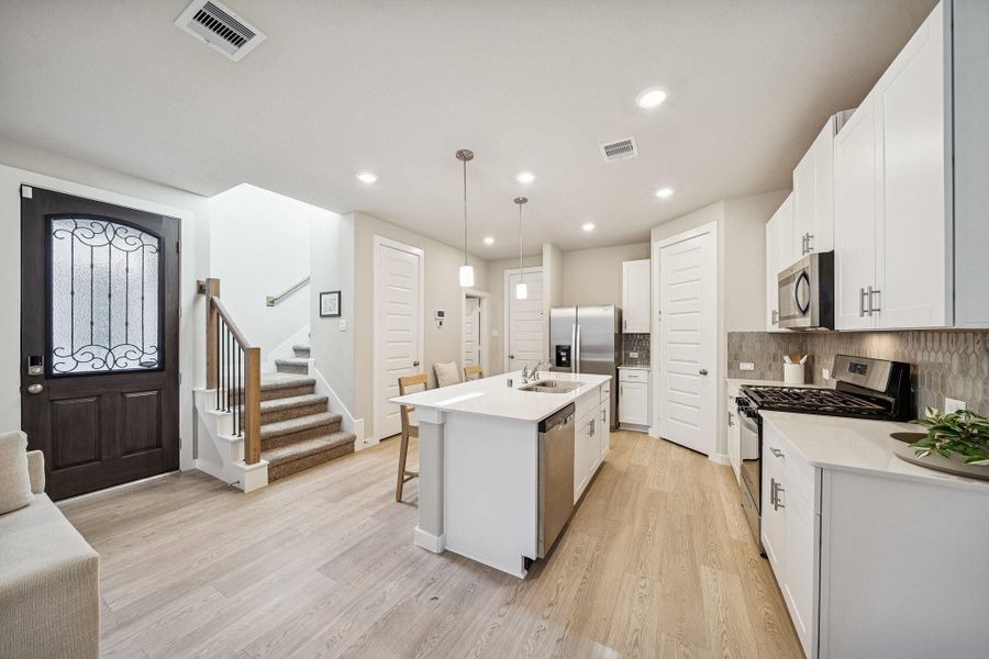 Furnished interior view inside a new home in Spring Brook Village - City Series, Houston (Image 6).
