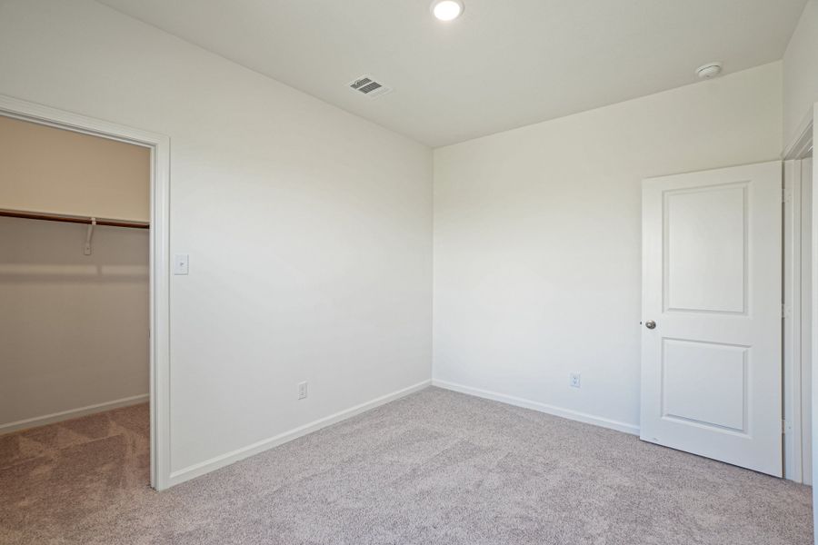 Representative unfurnished interior of a home built from the Odyssey by Starlight Homes in The Wilder, Adkins (Image 17). Representative unfurnished interior of a home built from the Odyssey by Starlight Homes in The Wilder, Adkins (Image 17).