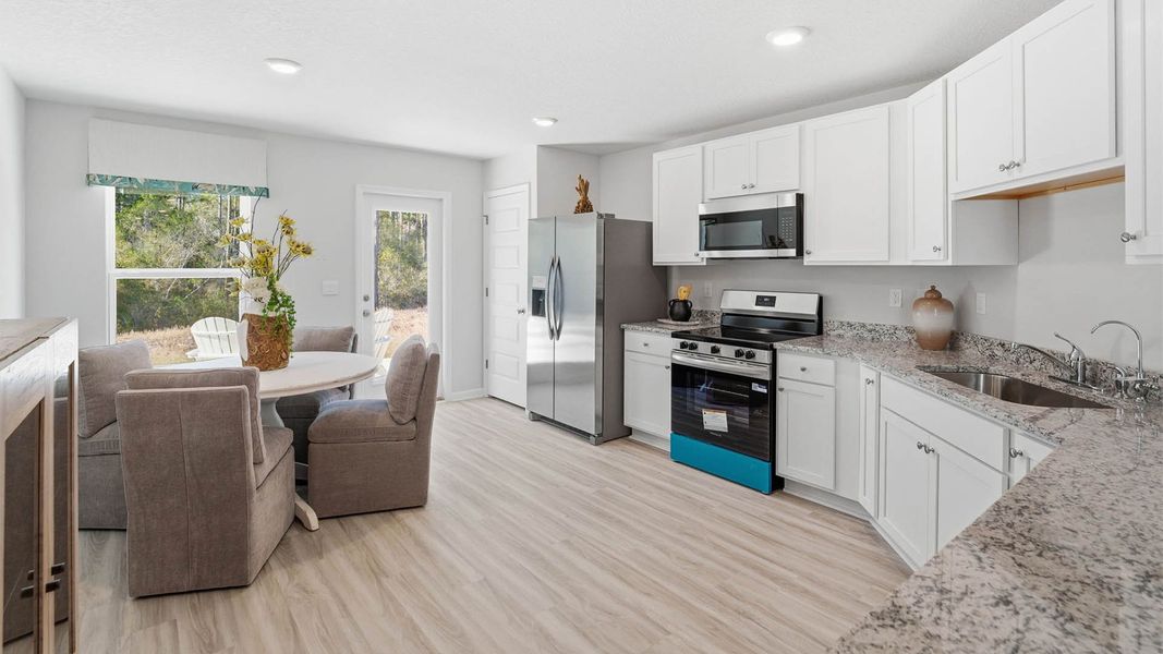 Furnished interior view inside a new home in Chateau Nemours, Port Saint Joe (Image 13).