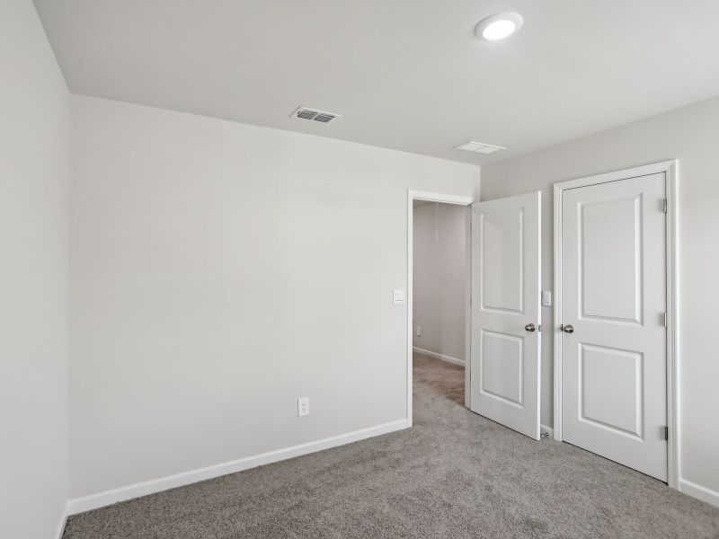 Spacious, unfurnished interior of a new home in Creekside at Oxford Park, Fairburn (Image 20). Spacious, unfurnished interior of a new home in Creekside at Oxford Park, Fairburn (Image 20).