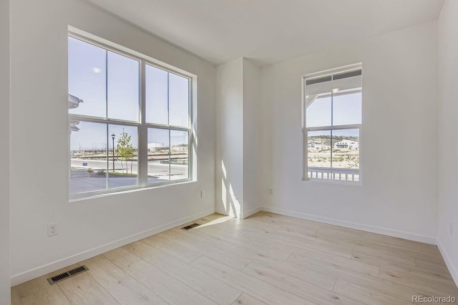 Spacious, unfurnished interior of a new home in Riano Ridge: The Pioneer Collection, Loveland (Image 9).