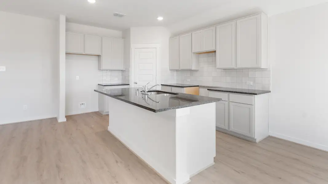 Representative furnished interior of a home built from the Blanton by Brightland Homes in Mostyn Springs, Magnolia (Image 5).