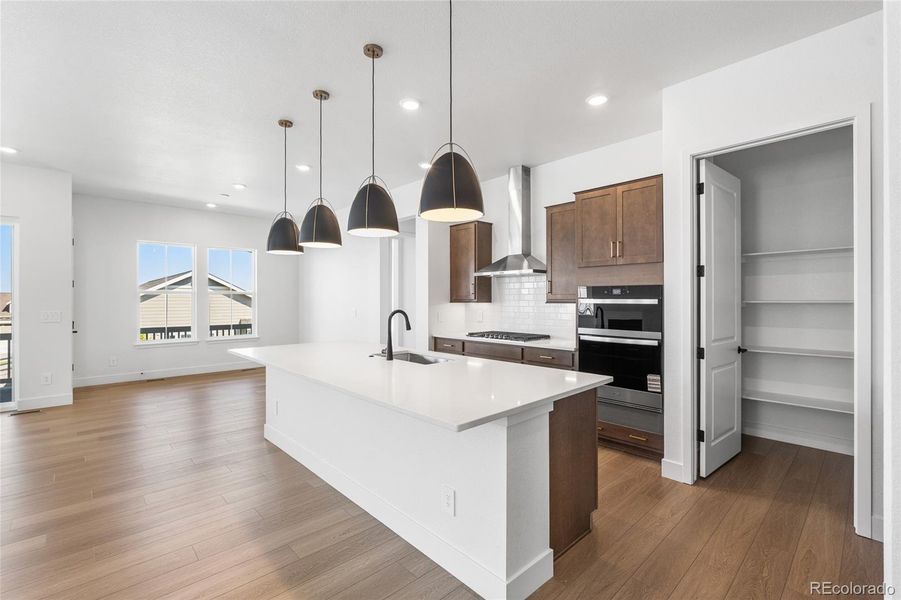 Furnished interior view inside a new home in Hilltop at Inspiration, Aurora (Image 8).