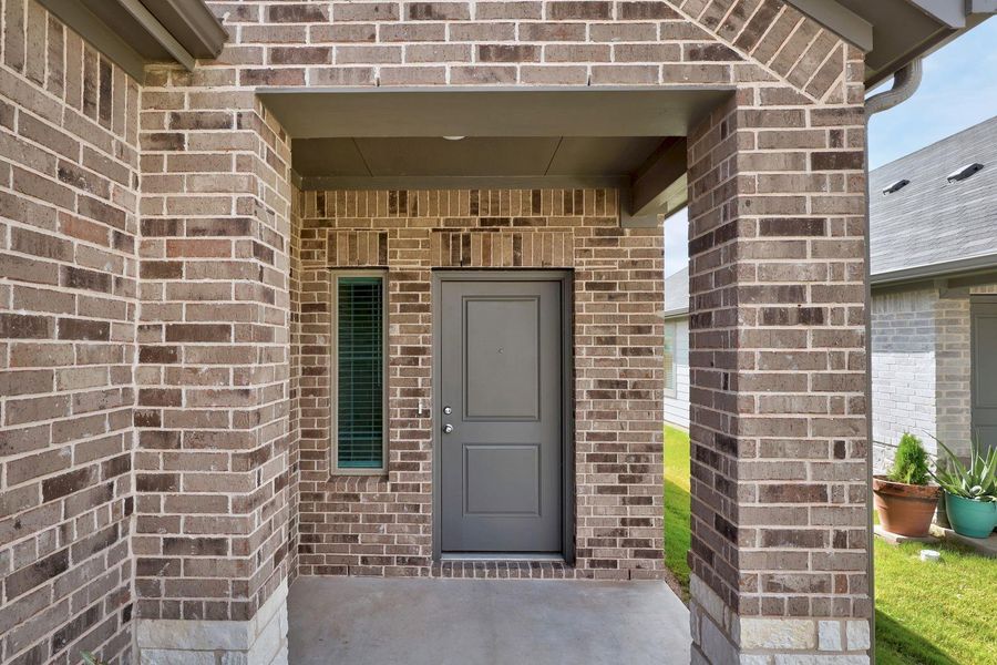Exterior details and patio area of a home in Trinity Ranch, Elgin (Image 4). Exterior details and patio area of a home in Trinity Ranch, Elgin (Image 4).