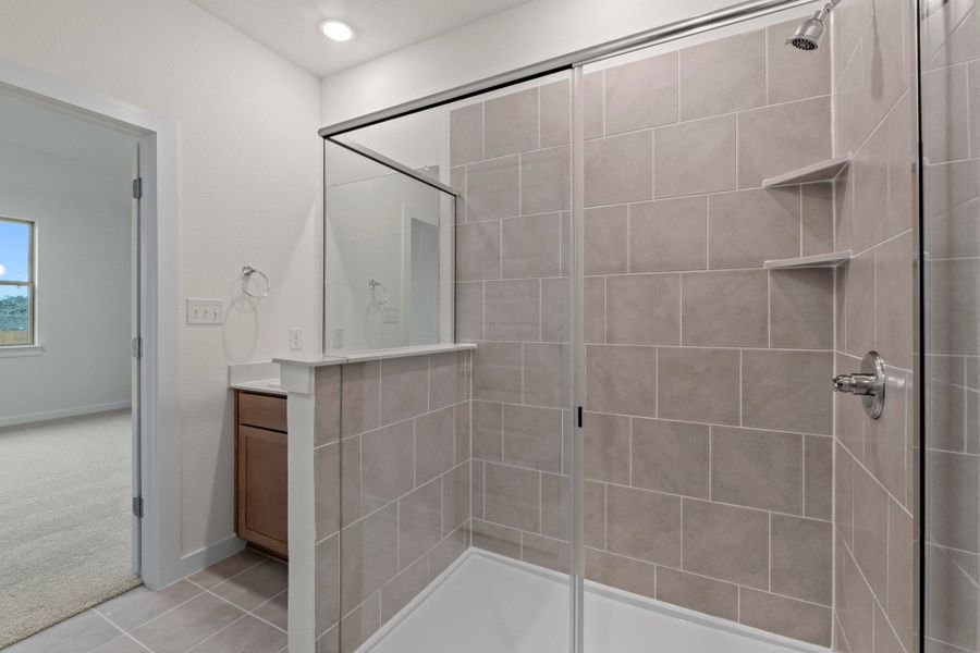 Primary Bathroom in the Pearl home plan by Trophy Signature Homes – REPRESENTATIVE PHOTO Primary Bathroom in the Pearl home plan by Trophy Signature Homes – REPRESENTATIVE PHOTO