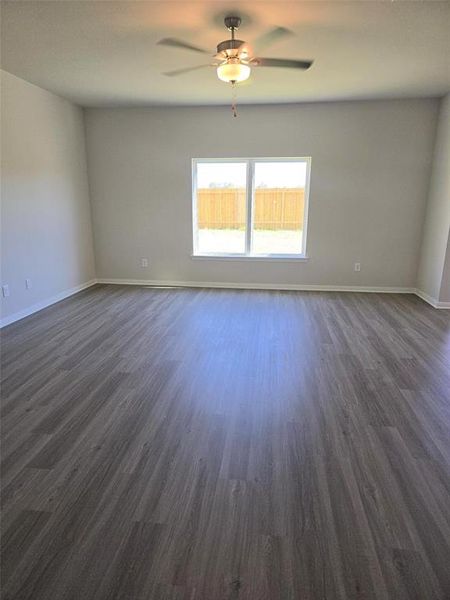 Not a fan of carpet? This living room features vinyl plank which gives this home that modern look.