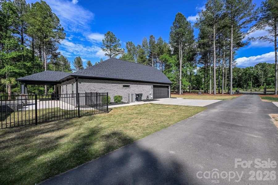 Exterior details and patio area of a home in , Marshville (Image 3).