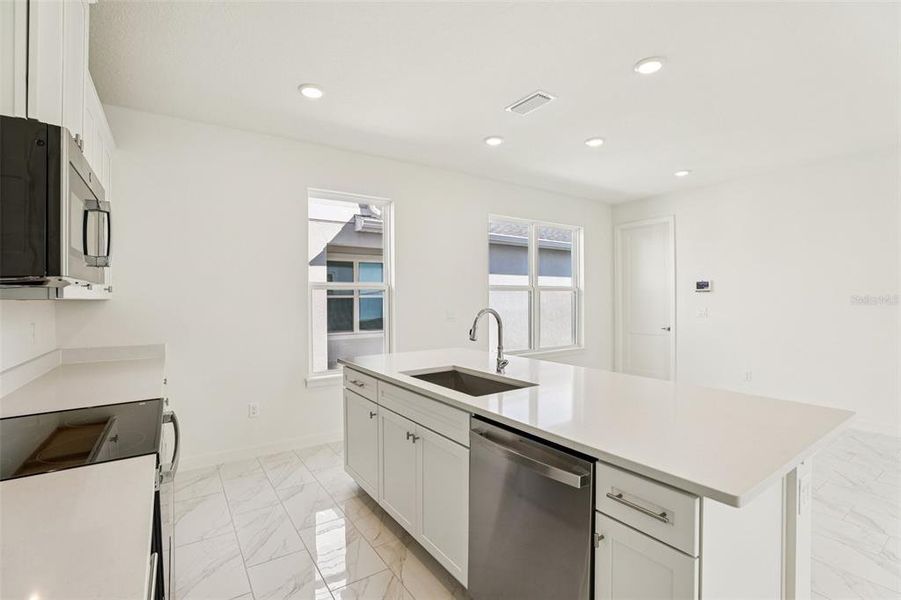 Furnished interior view inside a new home in Trinity Place, St. Cloud (Image 13).