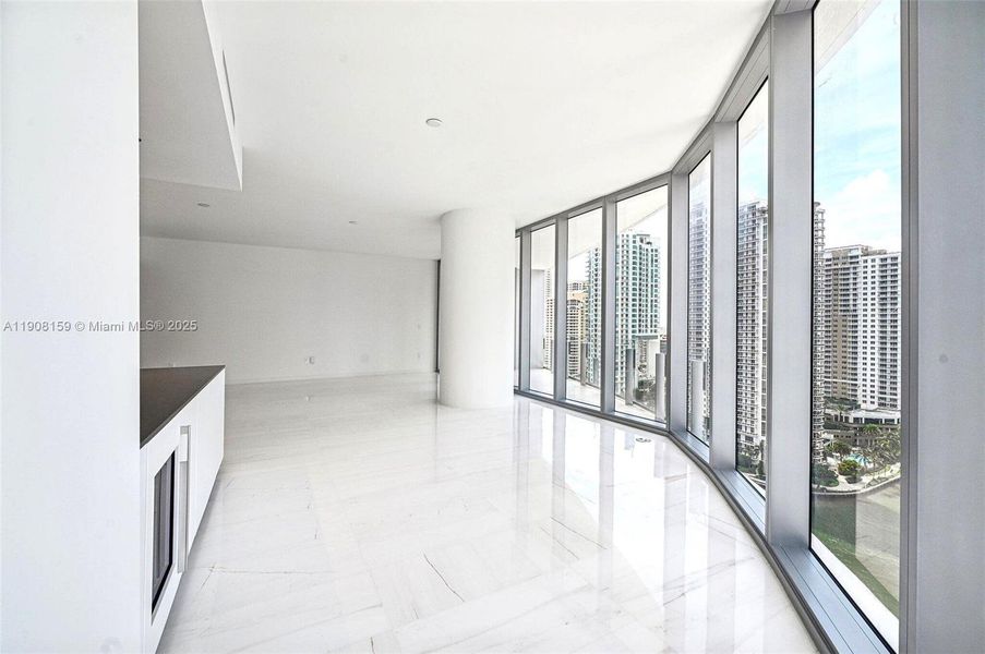 Spacious, unfurnished interior of a new home in Aston Martin Residences, Miami (Image 8).
