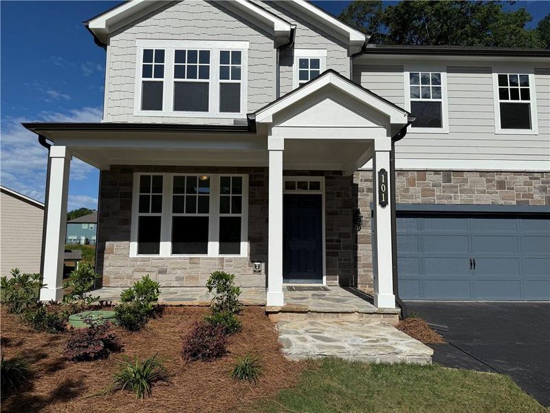 Front exterior of a new home in Creekside, Dawsonville, GA, highlighting curb appeal (Image 2).
