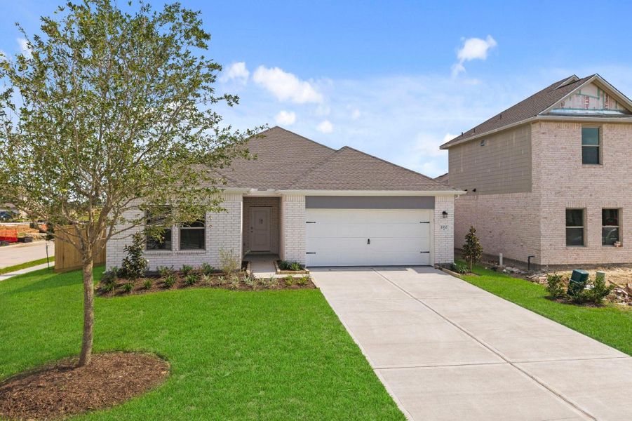 Front exterior of a new home in Windrose Green, Angleton, TX, highlighting curb appeal (Image 20). Front exterior of a new home in Windrose Green, Angleton, TX, highlighting curb appeal (Image 20).