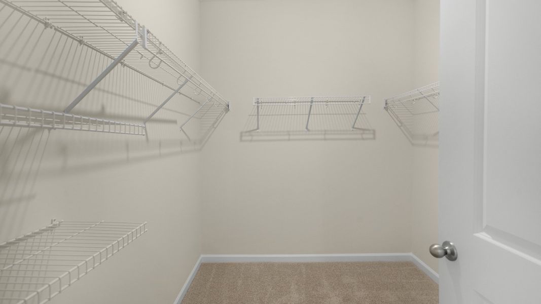 Spacious, unfurnished interior of a new home in The Grove at Matthews Landing, Fuquay Varina (Image 14).