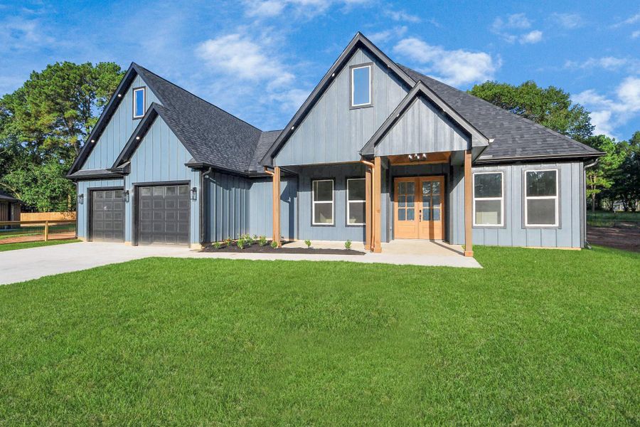 Front exterior of a new home in , Plantersville, TX, highlighting curb appeal (Image 1). Front exterior of a new home in , Plantersville, TX, highlighting curb appeal (Image 1).