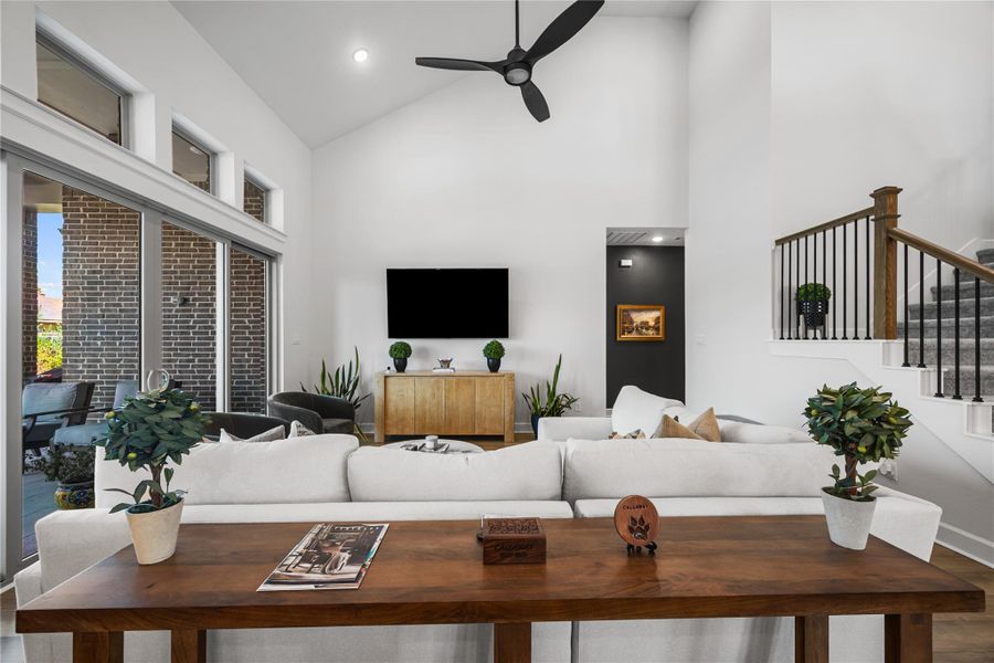 Spacious and inviting living area with abundant natural light and sliding glass doors providing seamless access to the outdoor living space