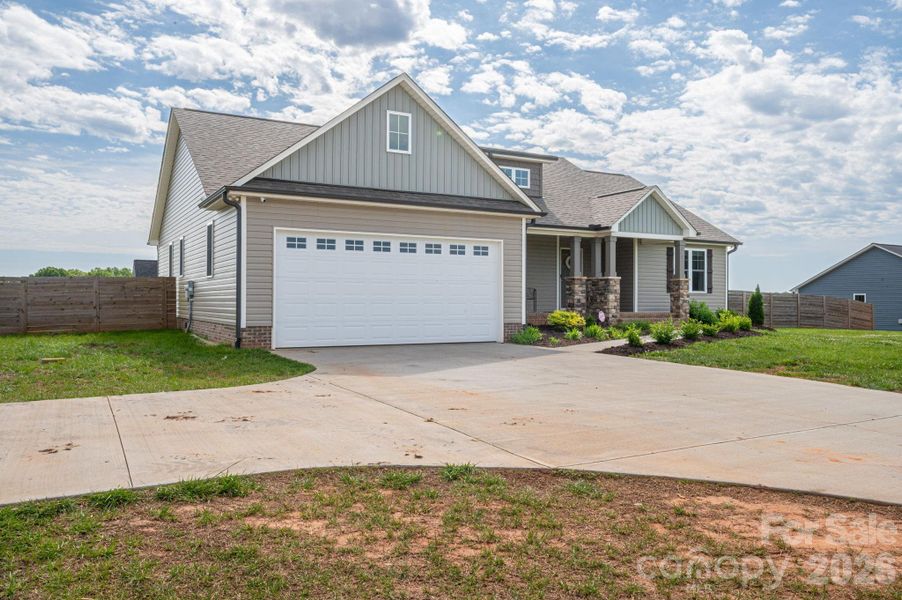 Front exterior of a new home in , Lincolnton, NC, highlighting curb appeal (Image 21).