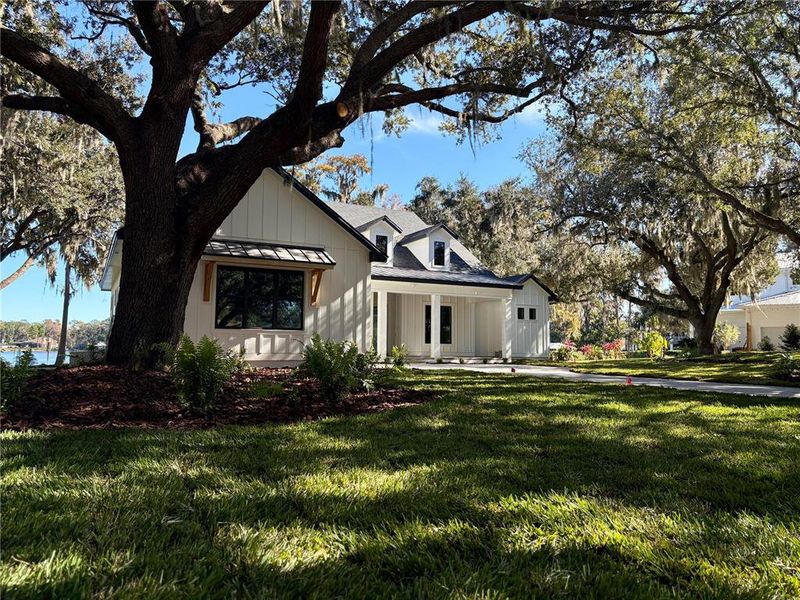Front exterior of a new home in , Odessa, FL, highlighting curb appeal (Image 6).