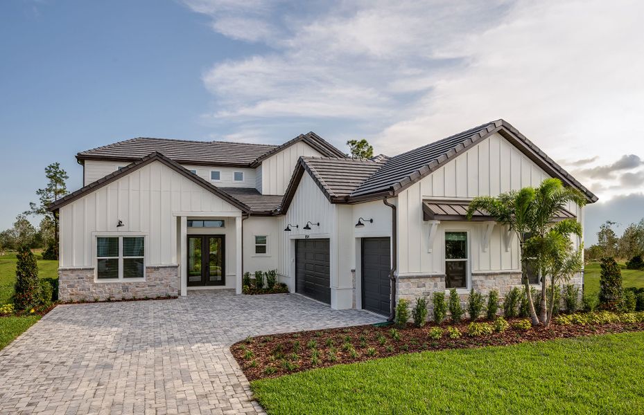 Representative exterior photo of a completed home built from the Aventura Grand by Pulte Homes in Two Rivers, Zephyrhills, FL (Image 20).
