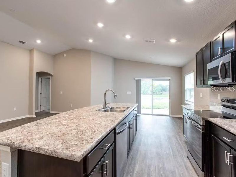 Furnished interior view inside a new home in Stonebridge North, Zephyrhills (Image 3).