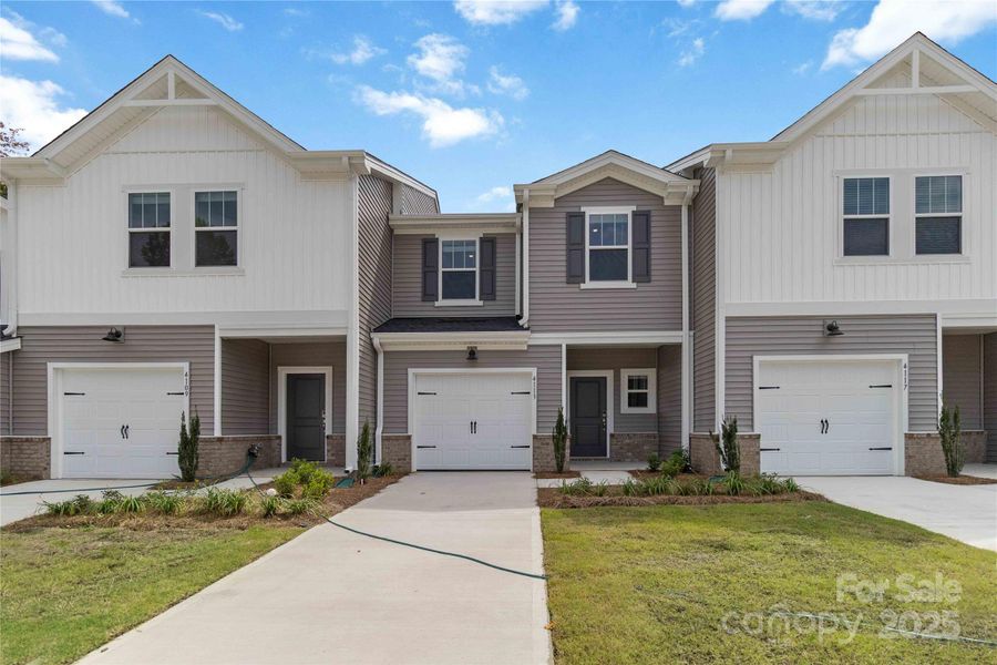 Front exterior of a new home in , Charlotte, NC, highlighting curb appeal (Image 16).