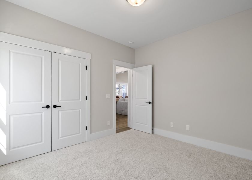 Representative unfurnished interior of a home built from the Wayside by Bill Clark Homes in The Sanctuary at Sunset Beach, Sunset Beach (Image 34).