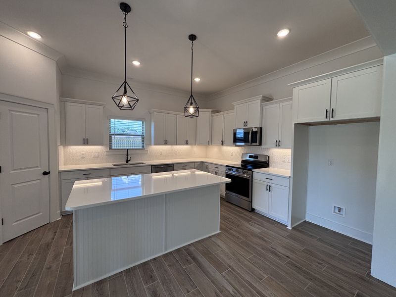 Furnished interior view inside a new home in Bird Song at Hammock Bay, Freeport (Image 10).