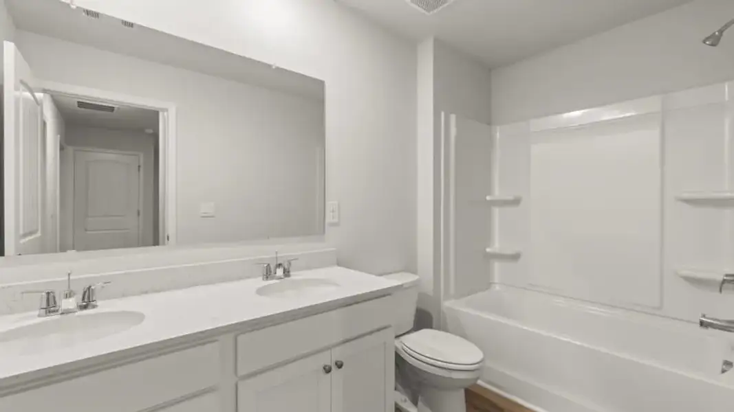 Furnished interior view inside a new home in Waypoint, Flowery Branch (Image 8).
