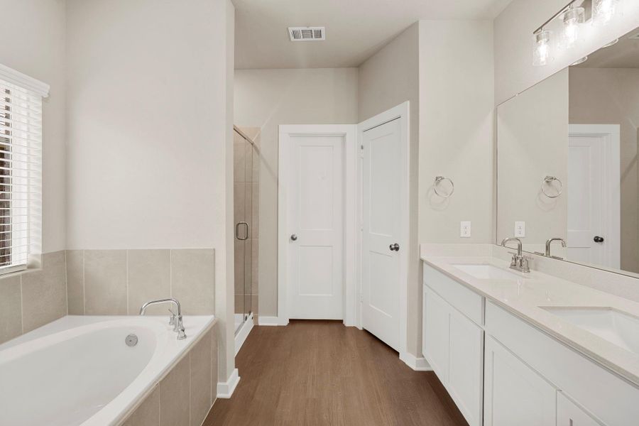 Spacious primary bathroom with lots of storage Spacious primary bathroom with lots of storage
