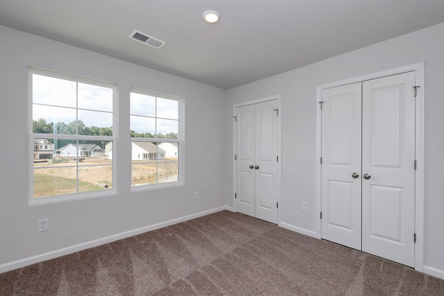 Spacious, unfurnished interior of a new home in Hainer Place, Conway (Image 24).